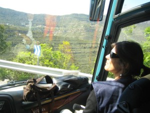 Cristina Mila tour guide at the bus of Barcelona Guide Bureau Daily Sightseeing Tours going towards Montserrat (1)