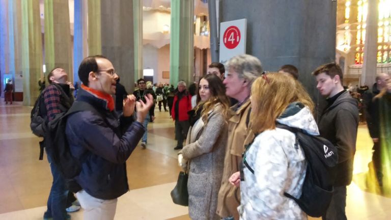 A guide during a tour inside Sagrada Familia